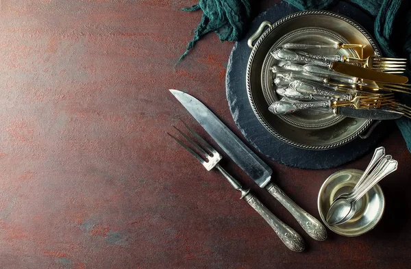 Old silver dishes with accessories for the kitchen