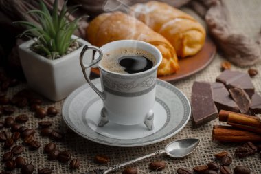 Kahve fincanındaki kahve fincanı, eski bir arka plan..