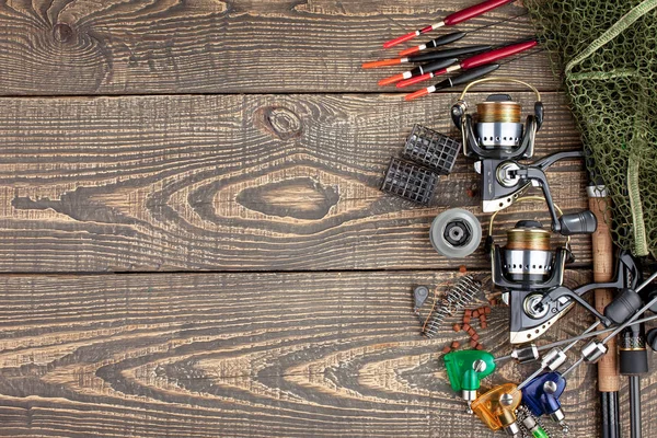 Fly Fishing Rod Flie And A Landing Net On The Old Wooden Table All Ready  For Fishing Stock Photo - Download Image Now - iStock