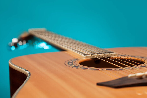 Acoustic guitar with blue light