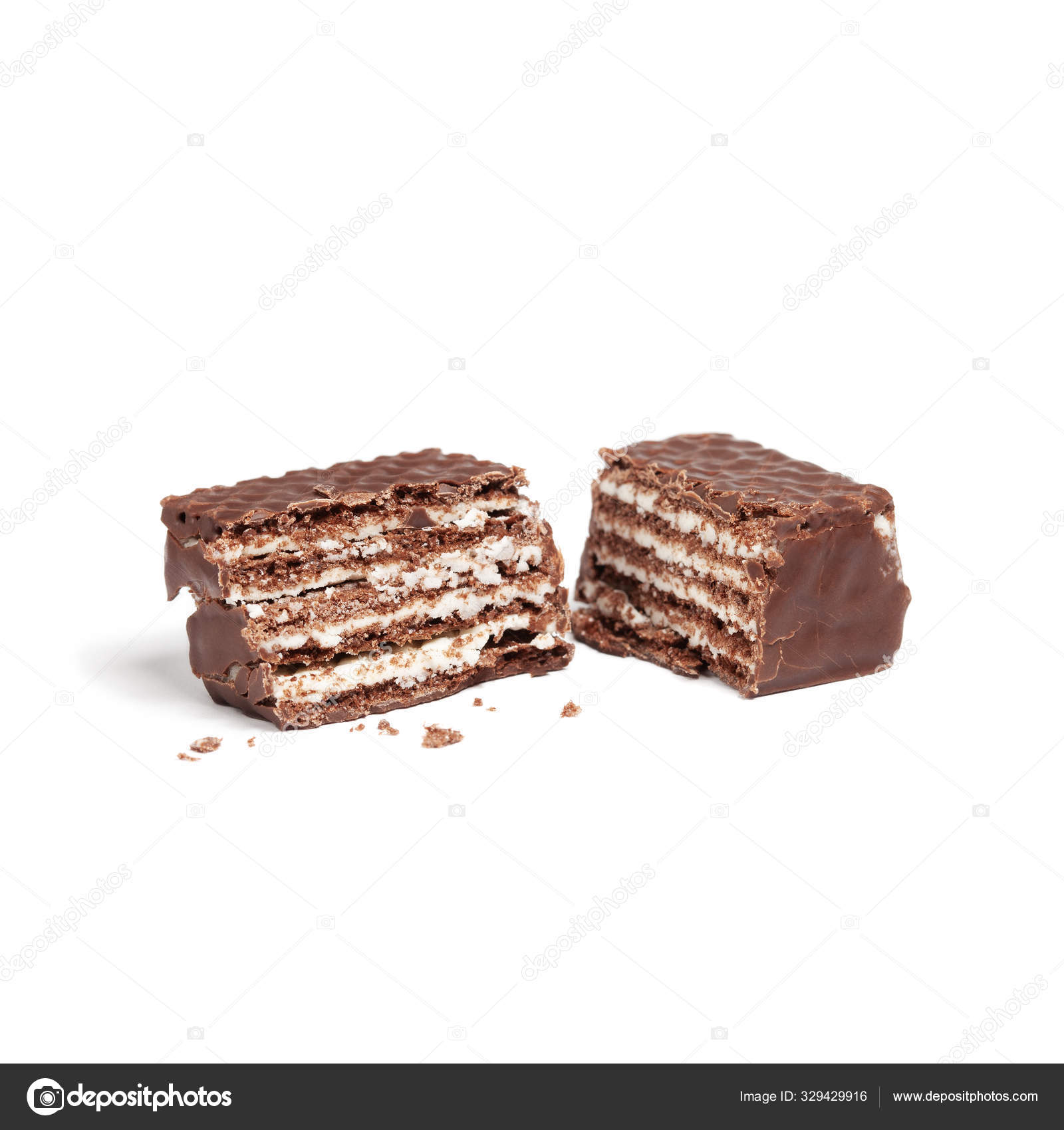 Wafer Cube With Chocolate And Milk Broken Into Two Halves On Whi Stock Photo C Photoslash 329429916