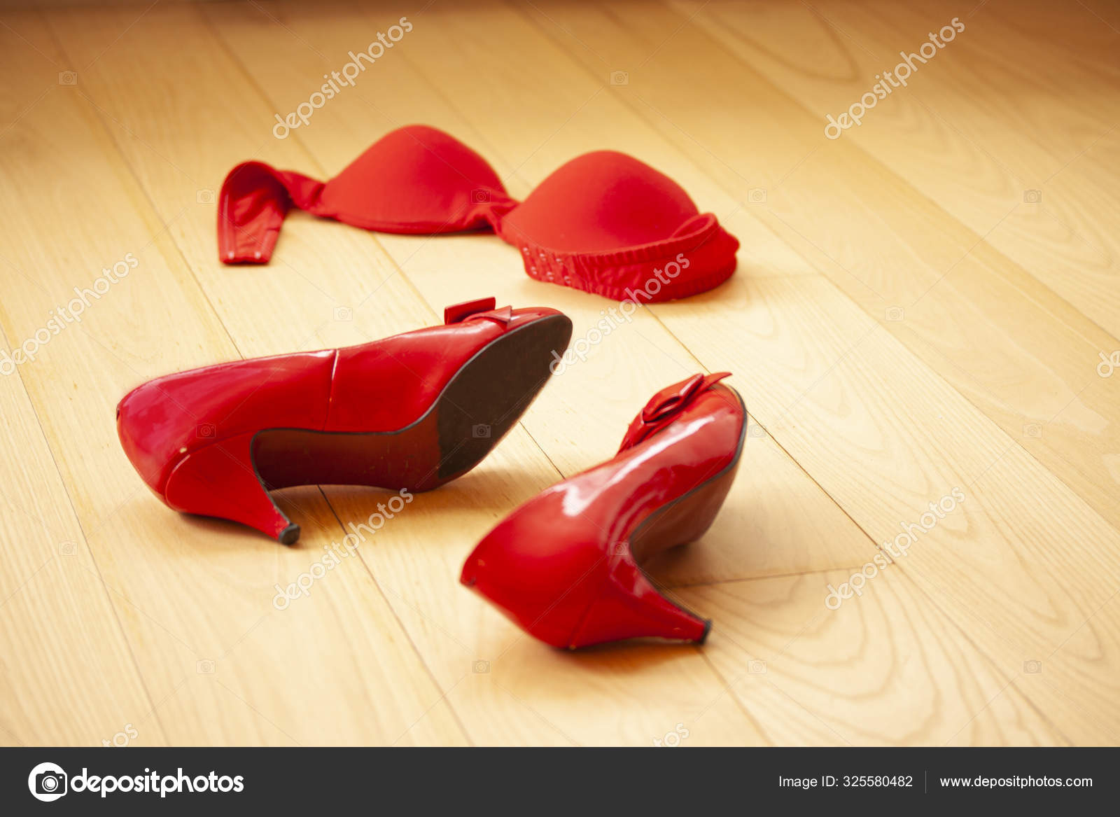 Red Lacquer High Heel Shoes Red Bra Lying Left Wooden Stock Photo by  ©oleschwander 325580482