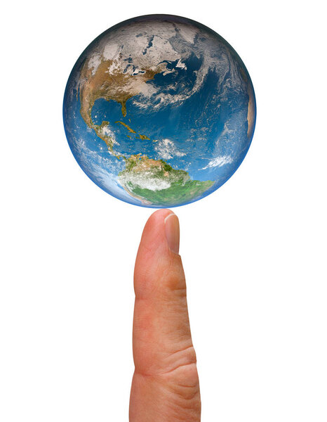 The Earth globe balances on the tip of a index finger isolated on white background. Evironmental concept. Close up image. Elements of this image furnished by NASA