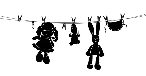 Silhouet speelgoed op touw te drogen na het wassen — Stockvector