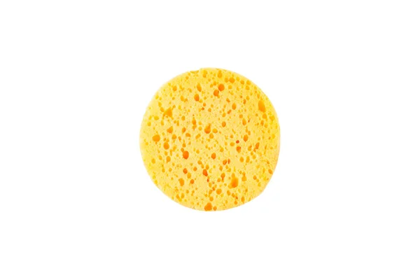 Okrągły żółty gąbka na białym tle — Zdjęcie stockowe