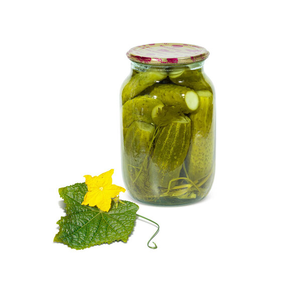 Preserved, pickled cucumbers in a glass jar isolated on white