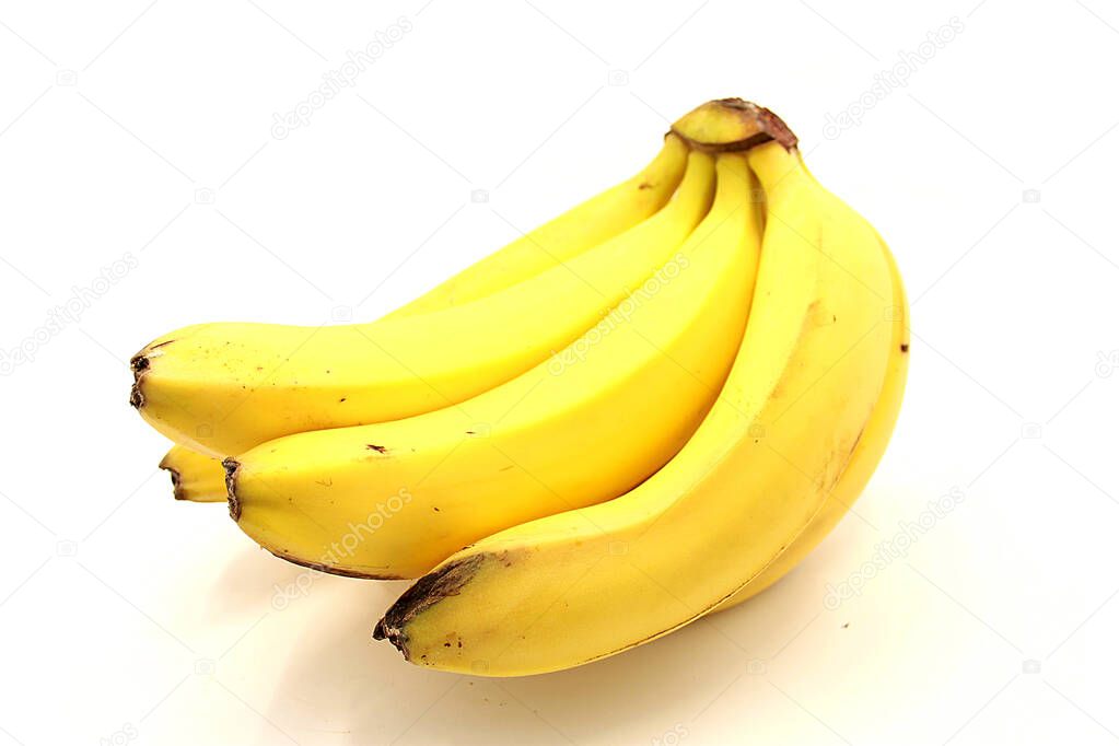 Beautiful ripe bananas closeup isolated on white background