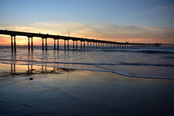 Puesta de sol en Ocean Beach Pier CA — Foto de Stock