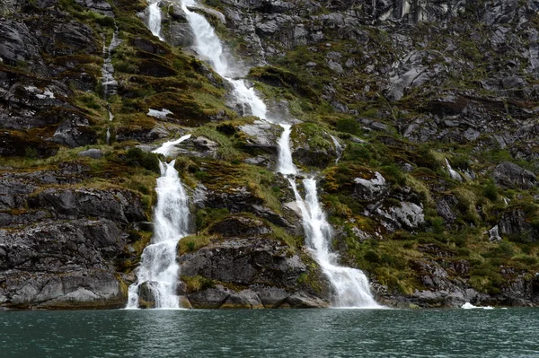 Waterfalls Nena glacier on the archipelago of Tierra del Fuego.