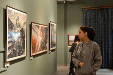  Viewers at the exhibition in Moscow state school of watercolour of Sergei Andriyaka in Gorokhovsky lane. clipart