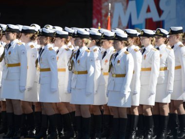  Girls-cadets of the Military University and Volsky military Institute of material support named after A. Khrulyov on rehearsal of parade on red square. clipart
