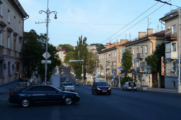 City in South-West of the Crimean Peninsula on Black sea coast. Ice-free sea  port, industrial, cultural and historical center. Street of Admiral Oktyabrskiy. — Stock Photo, Image