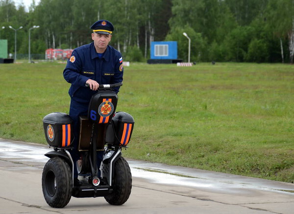  Officer of the Ministry for Emergencies on the Segway at the International Salon "Integrated Security-2017"