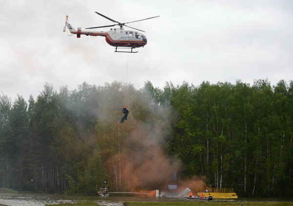  Evacuation with the help of a helicopter BO-105 Centrospas EMERCOM of Russia on the range of the Noginsk rescue center of the Ministry of Emergency Situations.
