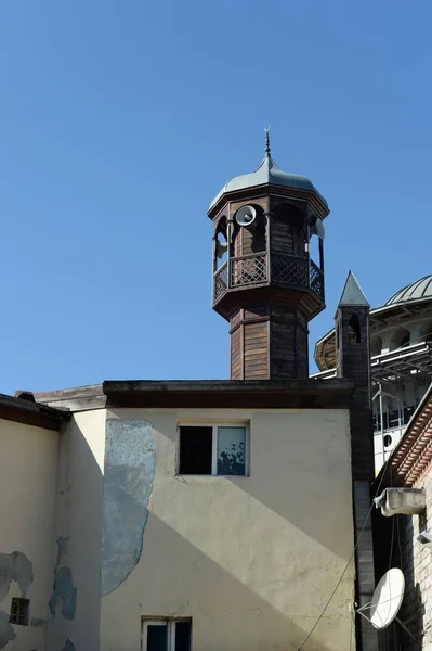 Wooden minaret of a mosque near Taksim Square in Istanbul — Stock Photo, Image