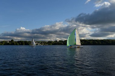  MOSCOW REGION, RUSSIA - JULY 6, 2019:Yachts on the Pirogovsky reservoir of the Moscow Canal