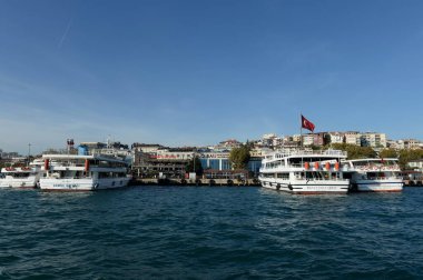 ISTANBUL,TURKEY - NOVEMBER 3, 2019:Pleasure boats at the Bahceehir University Pier in the Bosphorus. Istanbul