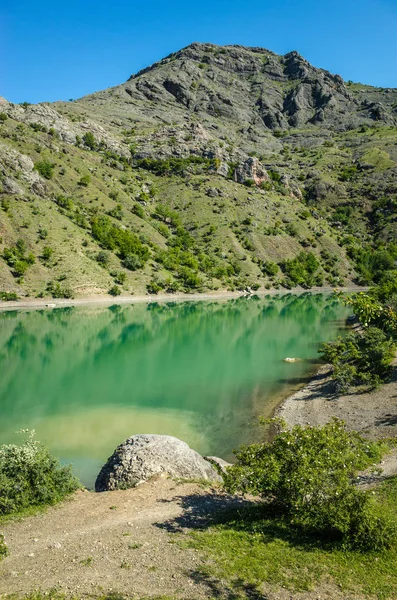 Turquoise color of Lake Panagia