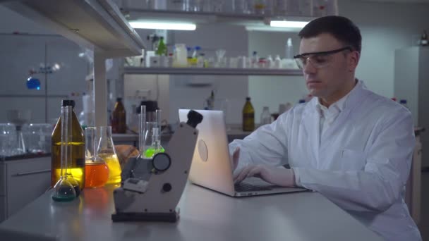 Scientists or doctor at working place. — Stock Video