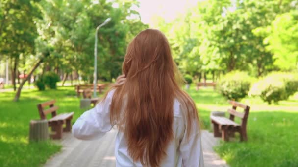 Redhead female going outdoors — 비디오