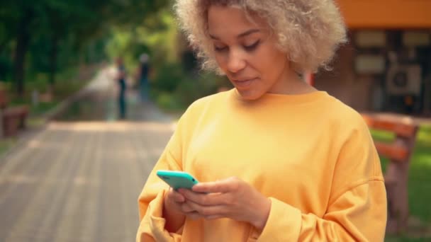 Close up portrait mixed race woman chatting online — Stock videók