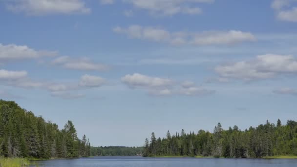 Wide view time lapse from a lake in Canada — Stock Video