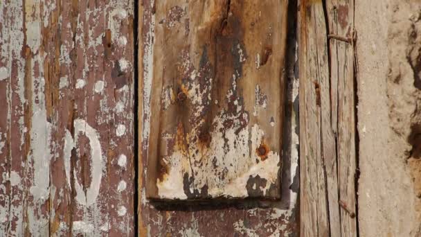 Fishermen houses builded into limestone near the ocean  Morocco  Door lock — Stock Video