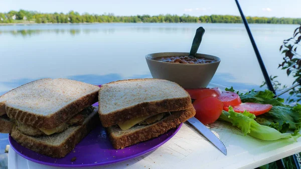 Two Sandwiches Vegetables Lake Background Stock Photo