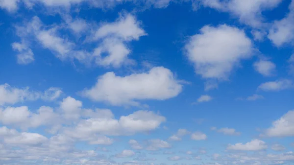 White clouds in a blue sky from Canada Royalty Free Stock Images