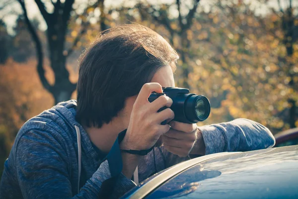 Photographer with digital camera — Stock Photo, Image