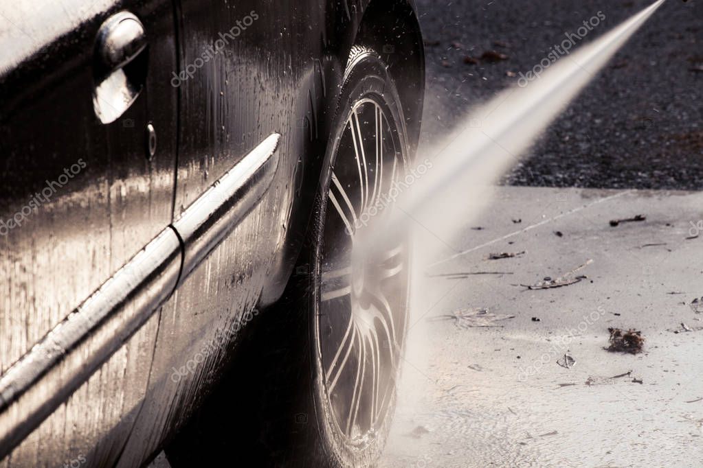 Car wash with pressure washer — Stock Photo © cokacoka 129087594
