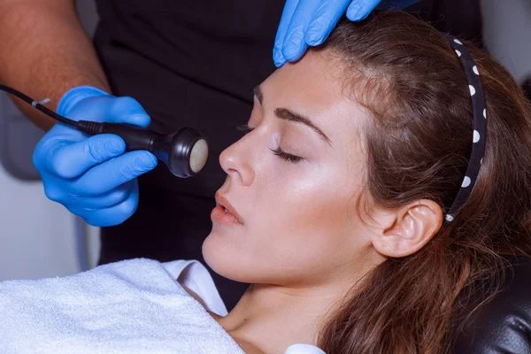 Woman face treatment at medical center — Stock Photo, Image