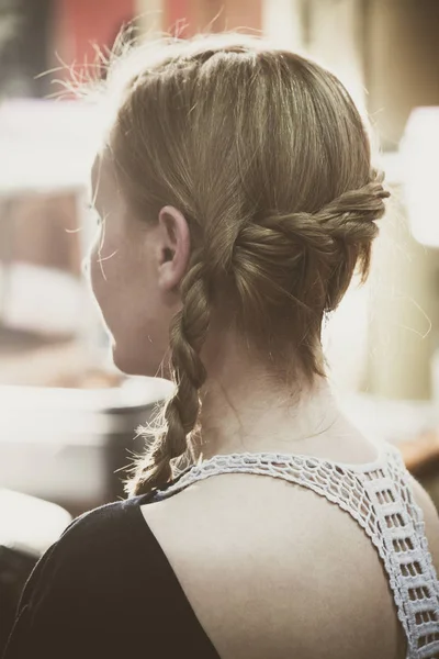 Woman portrait with modern style braid in hair — Stock Photo, Image