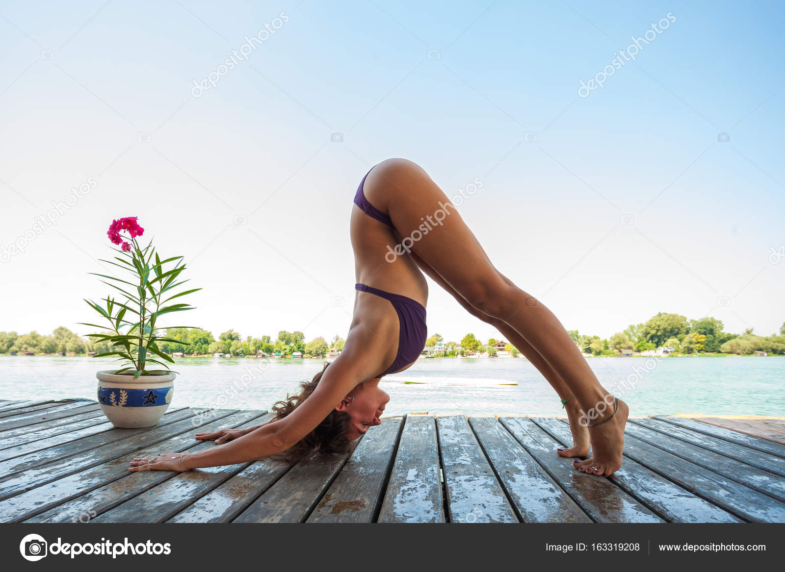 Adult Woman Long Black Dress Practice Yoga Lake Summer Day Stock