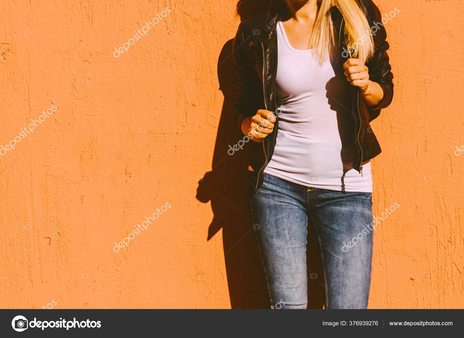 Woman wearing black t shirt and jeans hi-res stock photography and images -  Alamy