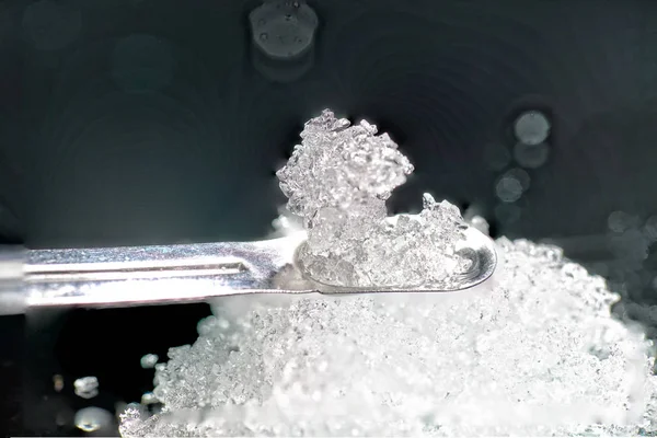 Chemical powder from the chemistry kit with macro lens photographed in studio