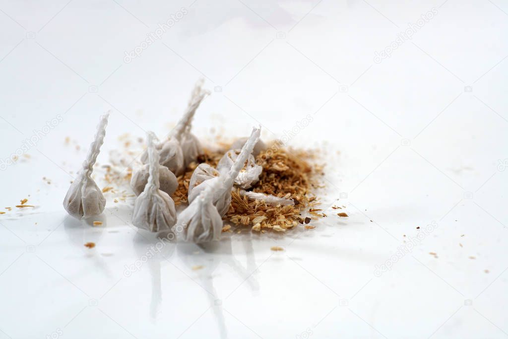 Crackers with sawdust to protect against unintentional ignitions