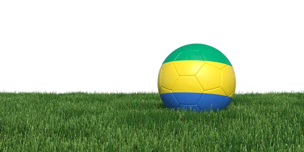 Gabon Gabons flagga fotboll bollen liggande i gräset — Stockfoto
