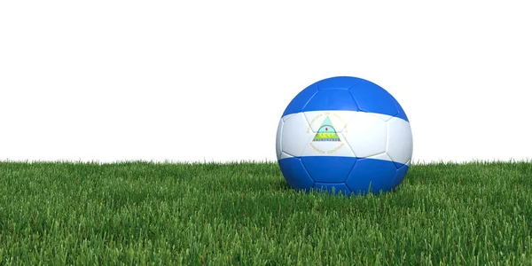 Piłka nożna Nikaragui flaga Nikaragui leżące w trawie — Zdjęcie stockowe