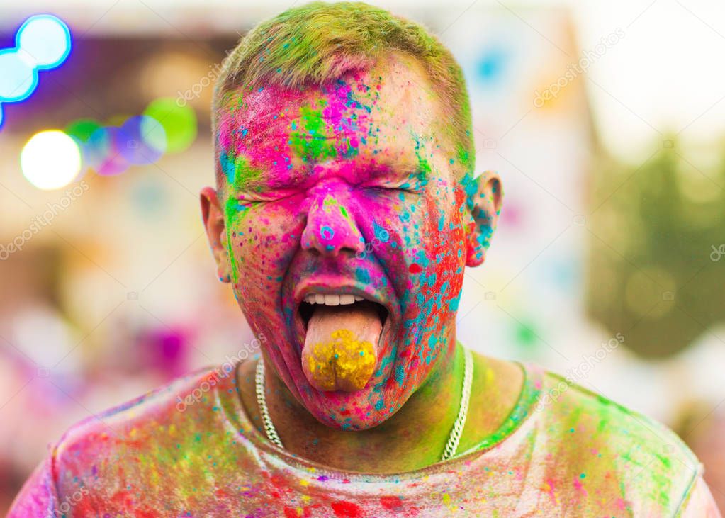 Guy  celebrate holi festival