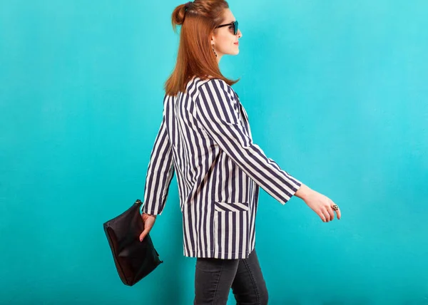 Fashion girl in studio near turquoise background smiling emotion — Stock Photo, Image