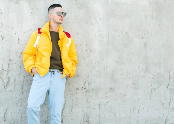 fashion guy with a backpack of products, shopping online, takeaway food