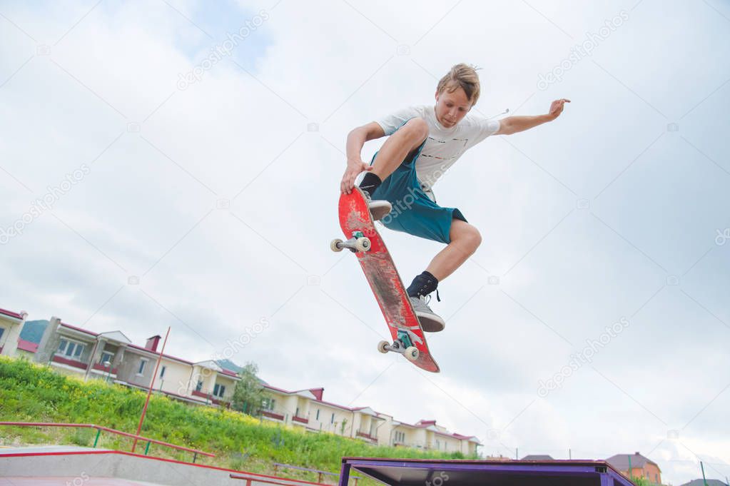 Young skateboarder in a jump