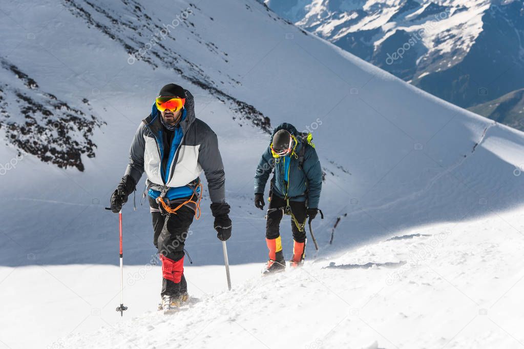 Two professional climbers go to the western peak of Elbrus