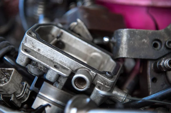 Disassembled mechanical high-pressure diesel pump. Components of the mechanism. Service of maintenance of diesel equipment — Stock Photo, Image