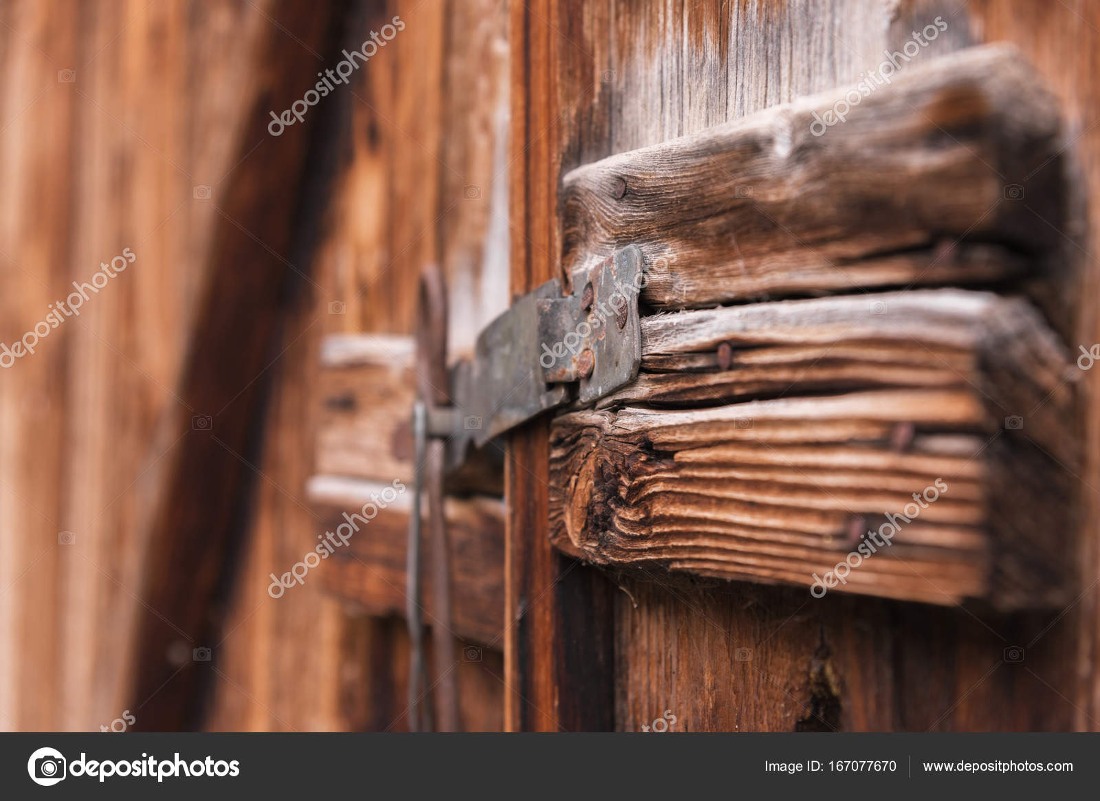 Old Simple Lock On A Wooden Door Closed With A Metal Pin Rustic