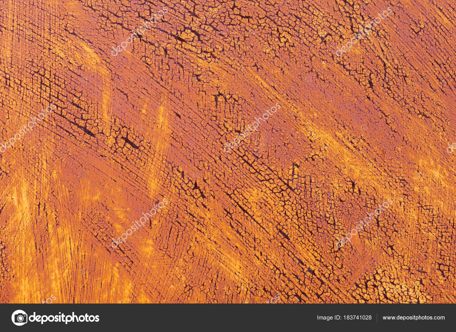 Fond texturé d'une peinture jaune fanée avec des fissures rouillées sur du métal rouillé