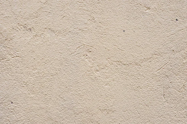 Textura Beige teñido de pared cementada, suavemente forrado. Textura exterior Pared exterior de paredes exteriores — Foto de Stock