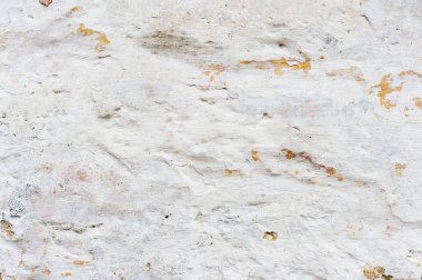 Grunge arka plan dokulu. Hacimsel duvar ile bir çok katmanlı kaplama kırık. Turuncu badanalı duvara fişleri. Doku derin bir desen ile