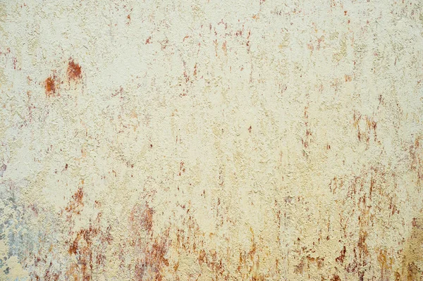 Fondo texturizado de pintura en escamas multicapa en la pared. Mezcla de diferentes colores de pinturas en las capas escindidas en la superficie. Textura grunge con un patrón profundo — Foto de Stock